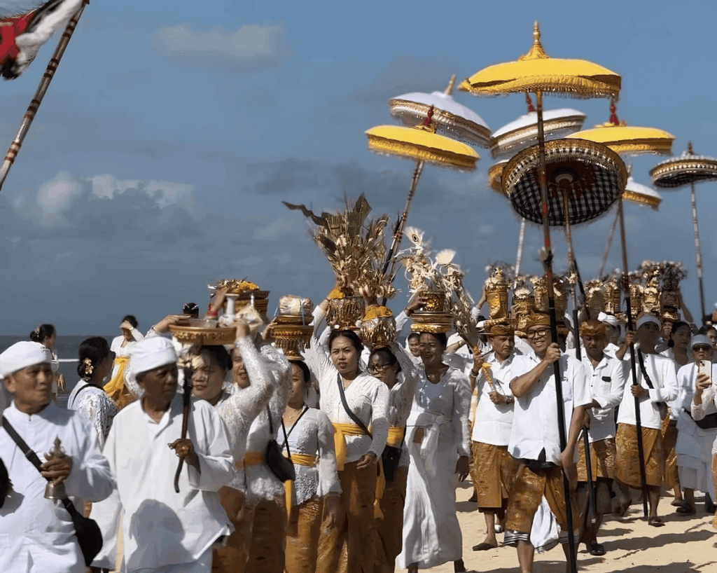 What to do in Bali on Silent Day: Balinese people performing traditional Nyepi rituals and religious procession before the island enters 24 hours of silence.