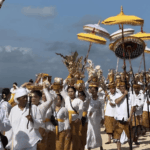 What to do in Bali on Silent Day: Balinese people performing traditional Nyepi rituals and religious procession before the island enters 24 hours of silence.